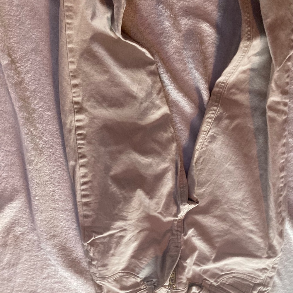 Gender neutral full legged tan jeans